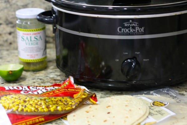 Easy Green Chile Chicken.  Made in the crockpot. 5 ingredient taco meal.