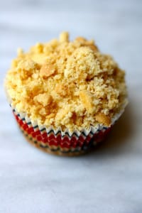 crumbled walkers shortbread on top of red white and blueberry cupcakes