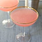 This pretty pink Blushing Grapefruit Cocktail is tangy and refreshing. A fun cocktail to say "cheers" with your gal pals.