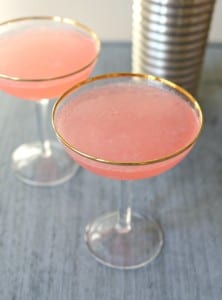 This pretty pink Blushing Grapefruit Cocktail is tangy and refreshing. A fun cocktail to say "cheers" with your gal pals.