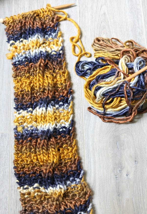 knit a cable knit scarf.