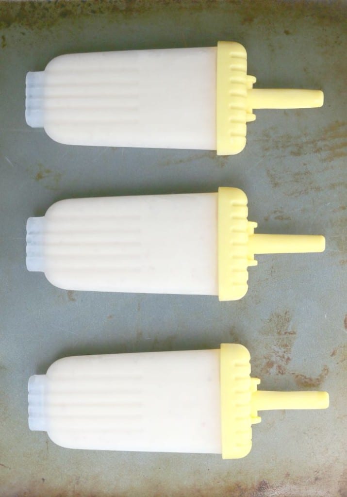 Easy to make Strawberry Mango Cream Popsicles. Tasty on a hot summer day.